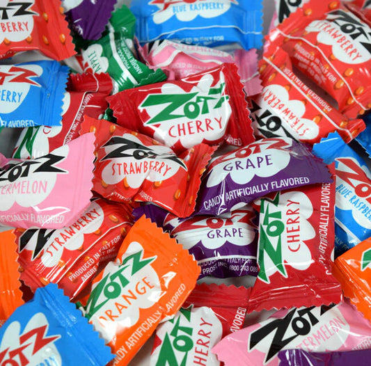 Assorted Zotz candy wrappers in various flavors.